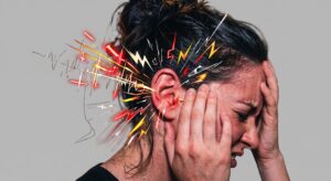 Ilustración de una persona sufriendo el impacto emocional y la hiperalerta provocados por los acúfenos y el tinnitus.